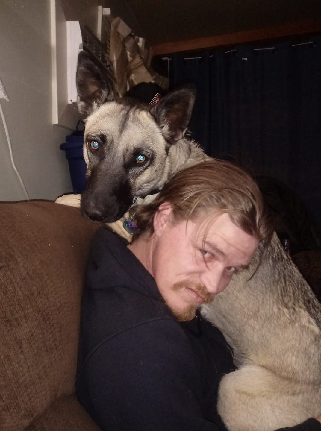 Matthew and Cleopatra cuddling